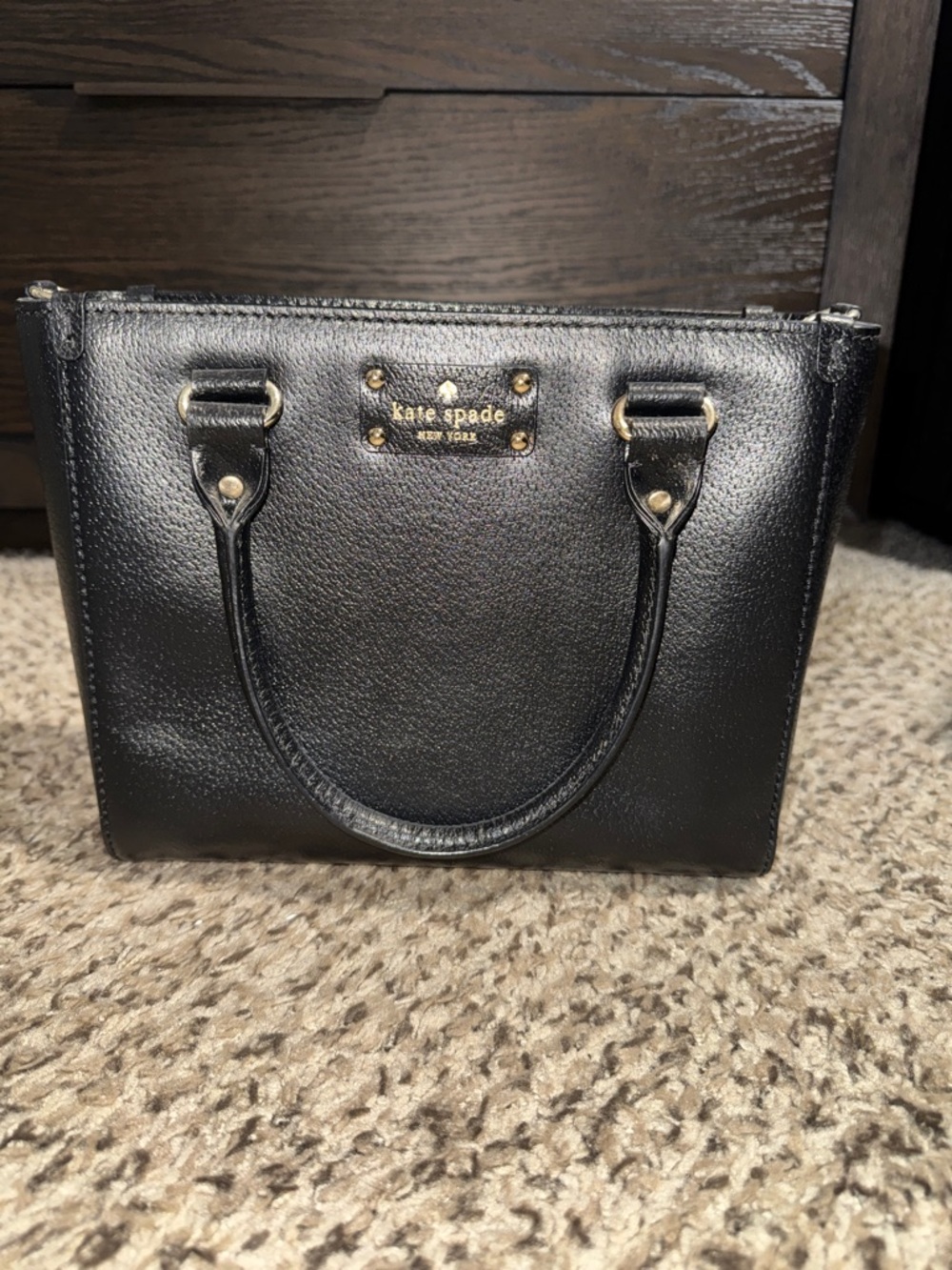 kate spade black pebbled leather satchel with gold plaque